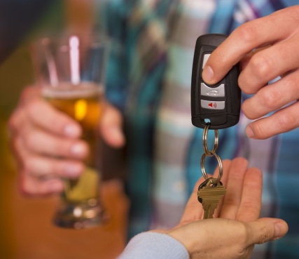 Handing car keys to dial a driver in Wellington